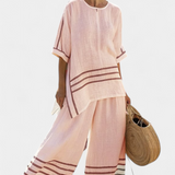 Overal s širokými pruhmi a asymetrickým strihom - moderný a pohodlný štýl